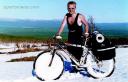 The bicyclist submits snow mountains